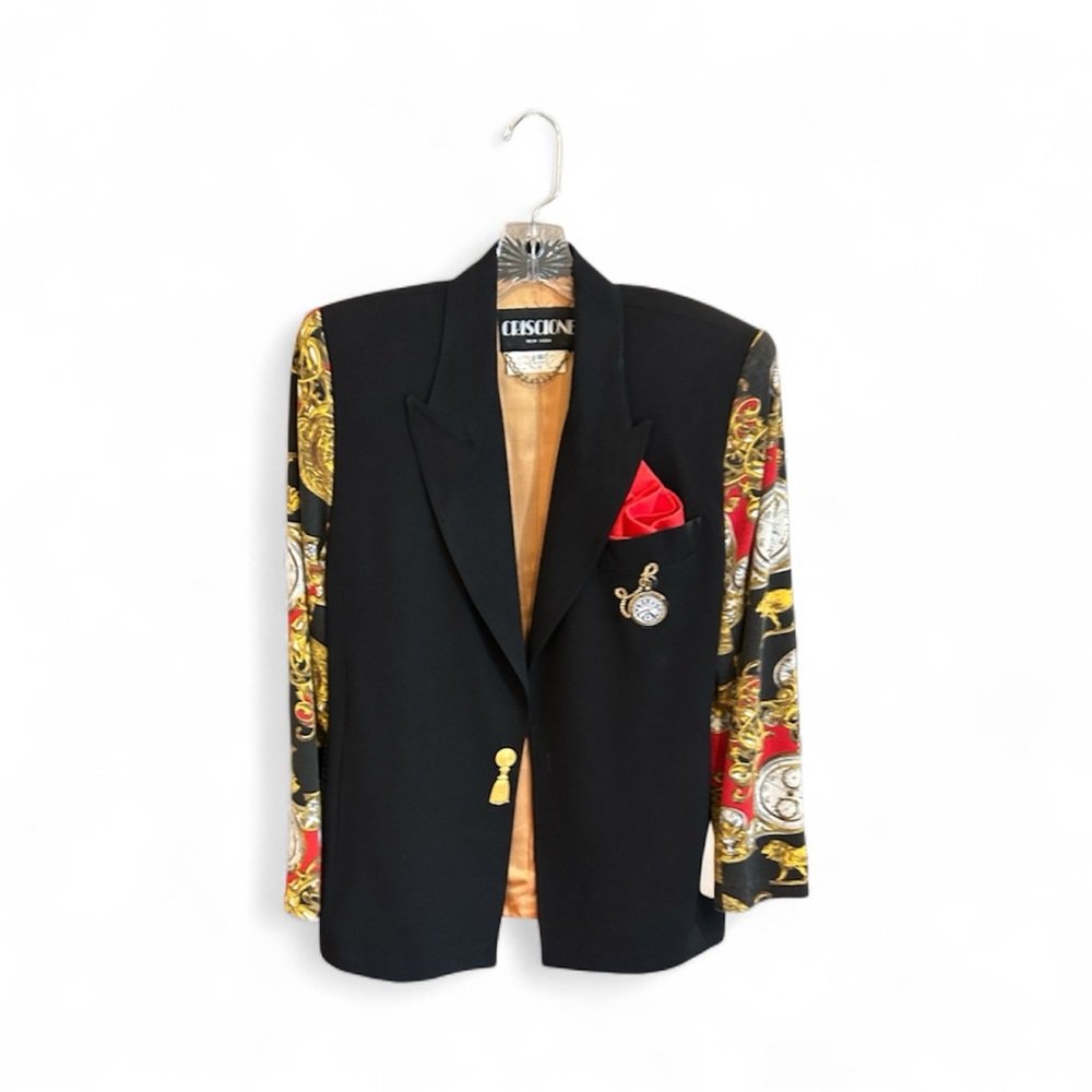 Black two piece suit with red pocket square, printed sleeves